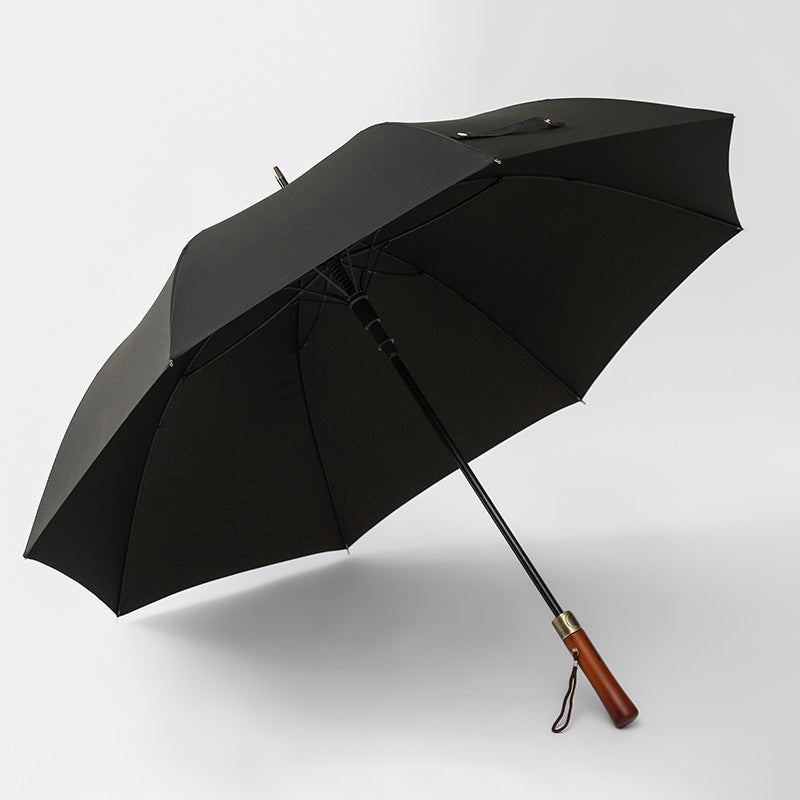 Black umbrella with a wooden handle