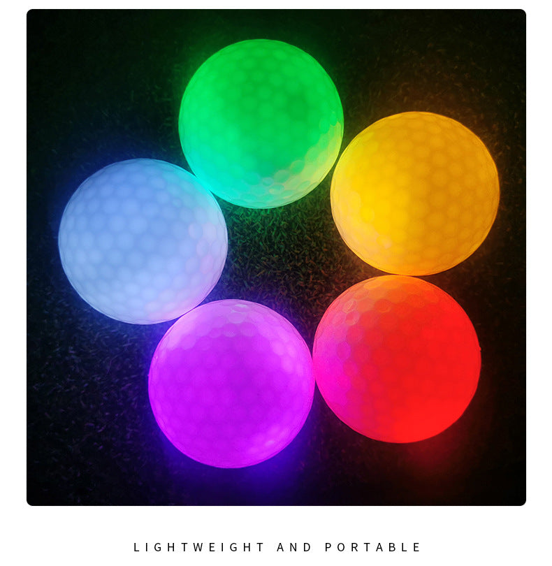 Five glowing golf balls in green, yellow, blue, purple, and red