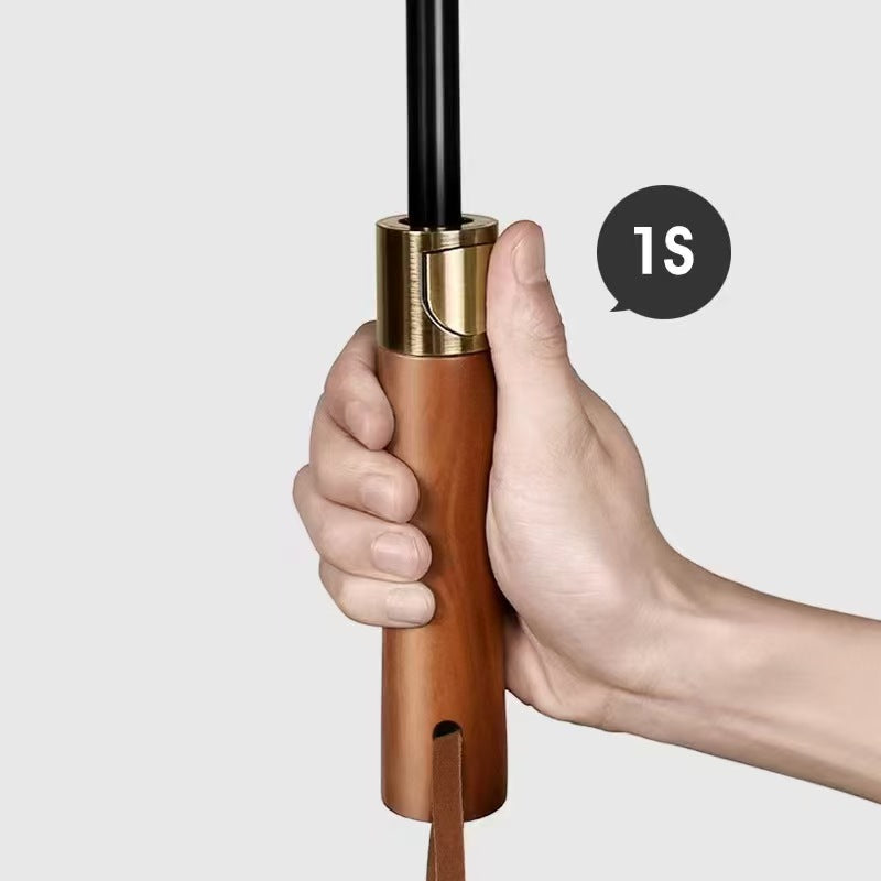 a wooden umbrella with a gold accent
