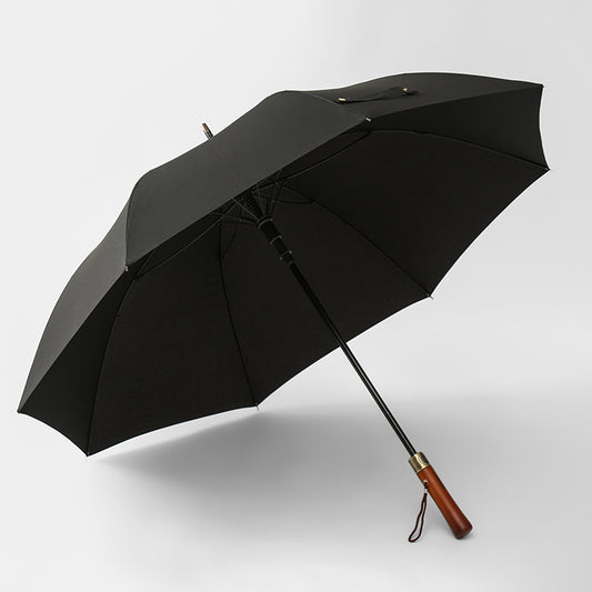 Black umbrella with a wooden handle 