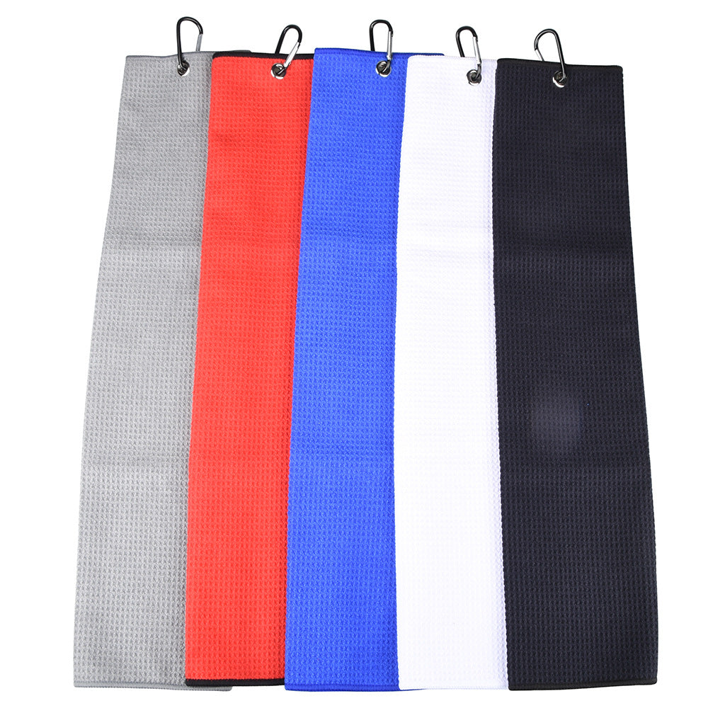 Five rectangular towels in gray, red, blue, white, and black with metal hooks 