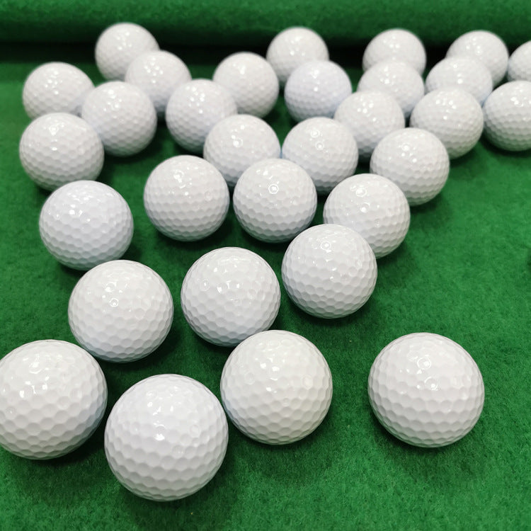 Multiple white golf balls 
