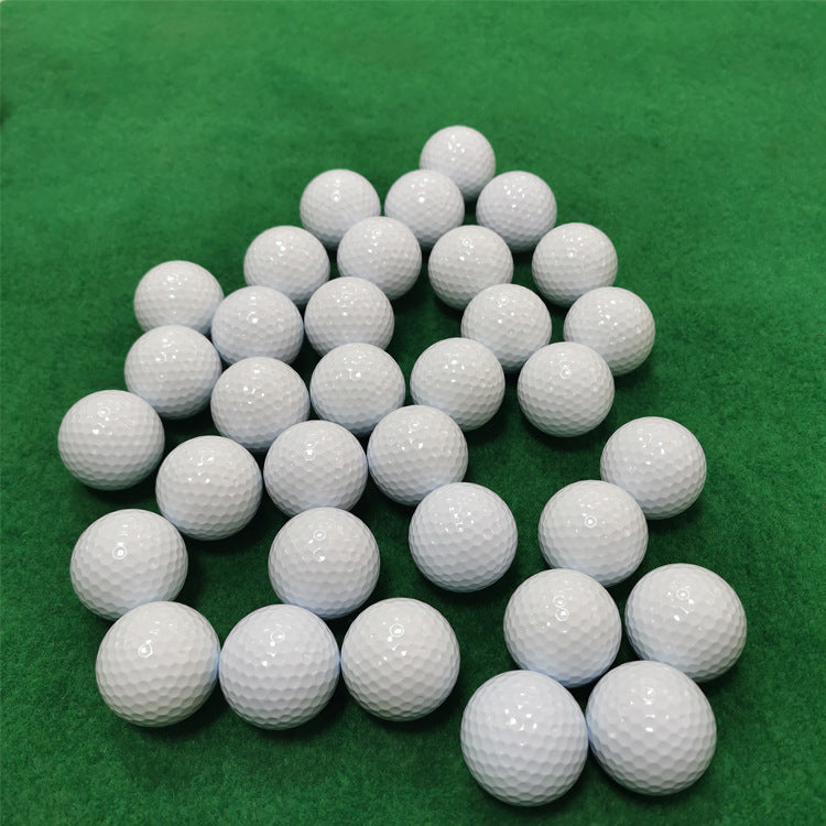 Multiple white golf balls 