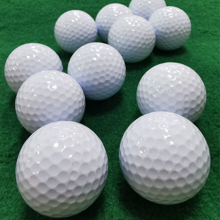 Multiple white golf balls 