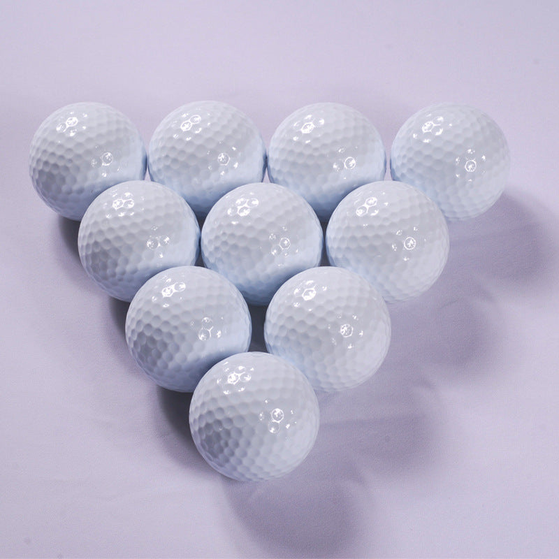 Multiple white golf balls 