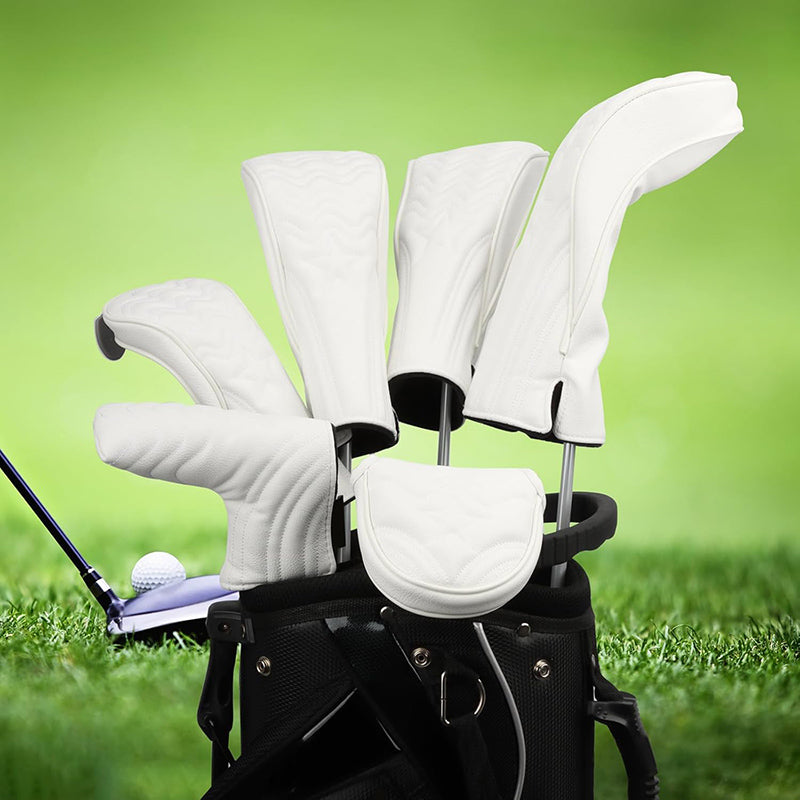 Golf clubs with white heads in a black bag 