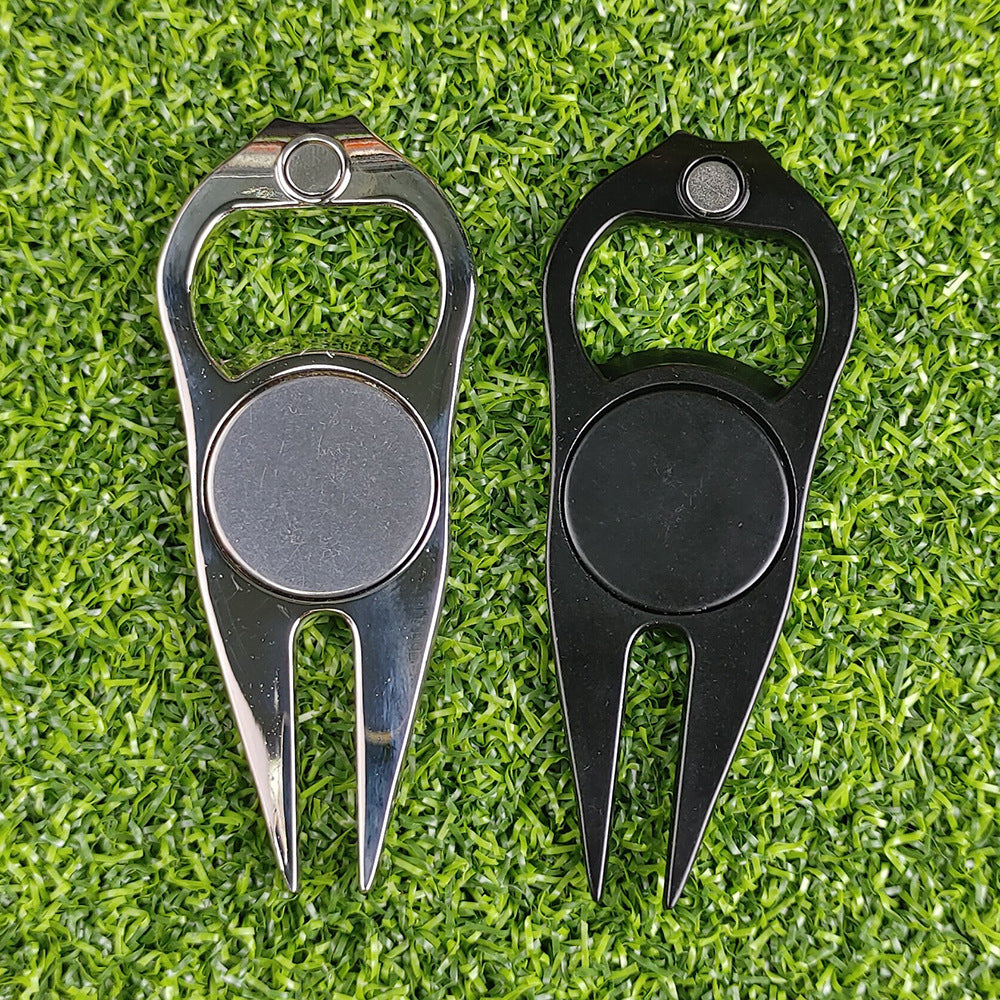 Two golf divots, one silver and one black