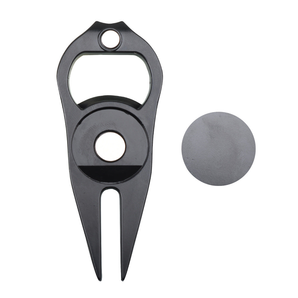 Black golf divot tool with a ball marker 