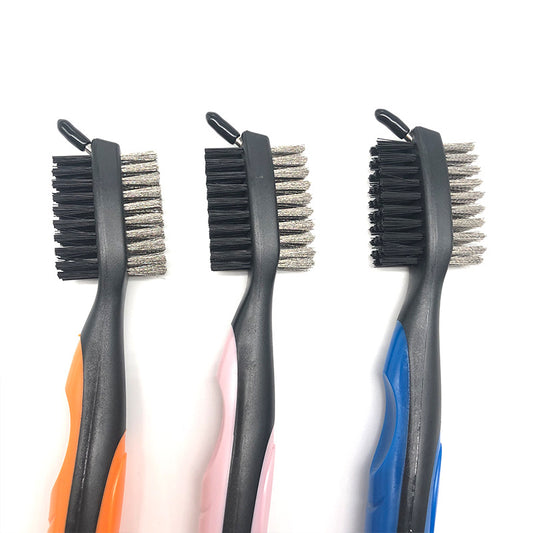 Three scrub brushes with different handle colors 